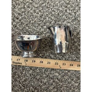 Vintage silver on copper creamer and sugar bowl set
